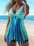 Azul | Conjunto de tankini acampanado a rayas que cubre el vientre
